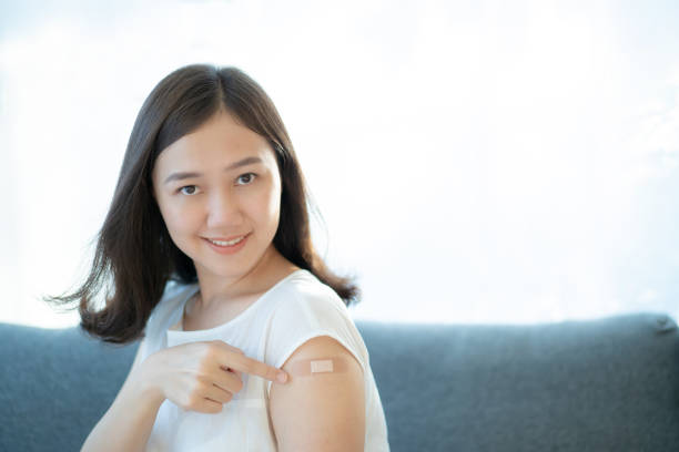 istock Happy Asian woman after vaccinated. 1326901855