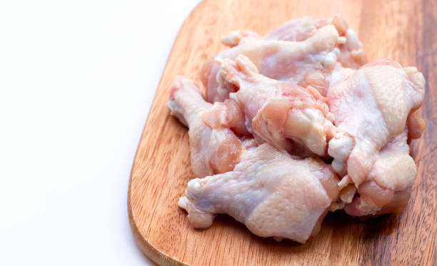 istock Fresh raw chicken wings (wingstick) on cutting board 1326904114