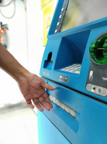 istock Waiting for cash withdraw from atm machine 1326904259