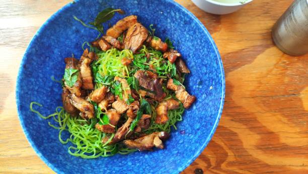 istock Thai Stir Fried Basil with Pork and noodle. 1326904739
