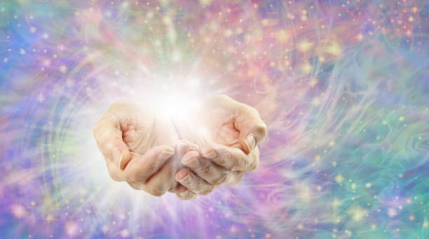 istock Ethereal Healing Energy radiating from cupped hands 1326904842