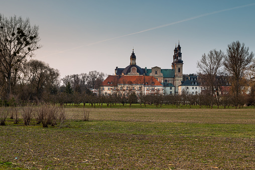 Lad Abbey is a former Cistercians monastery in Lad (village), Poland. Lad Abbey is designated an official Polish Historic Monument.