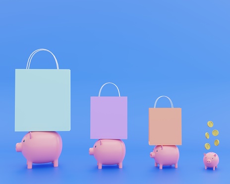 Saving money in a pink piggy bank for use in shopping