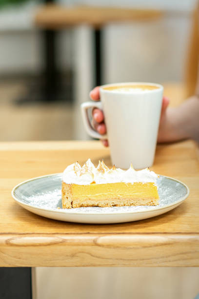 istock Young female drinking coffee in cafe 1326912164