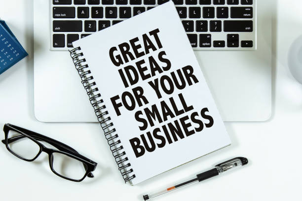 istock Great Ideas For Your Small Business text on notepad with laptop on office desk. 1326916570