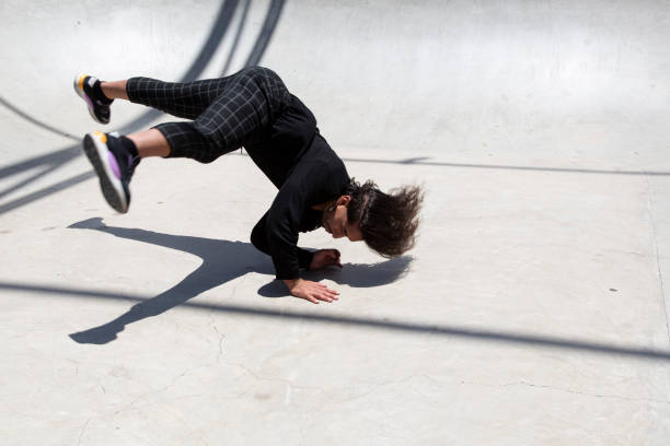 istock Hispanic latin man performing street dance inside skating pit. 1326917548