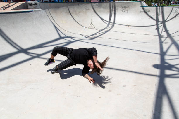 istock Hispanic latin man performing street dance inside skating pit. 1326917562