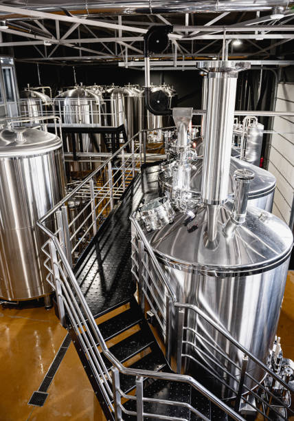istock Craft beer brewing equipment in privat brewery 1326920374
