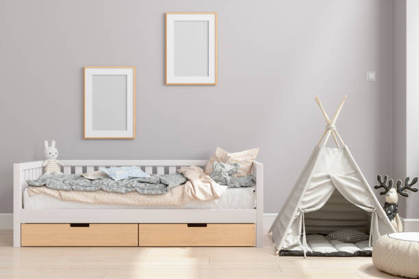 Child Room Interior With Messy Bed, Tent And Empty Picture Frames On The Wall. Child Room Interior With Messy Bed, Tent And Empty Picture Frames On The Wall. nursery bedroom photos stock pictures, royalty-free photos & images