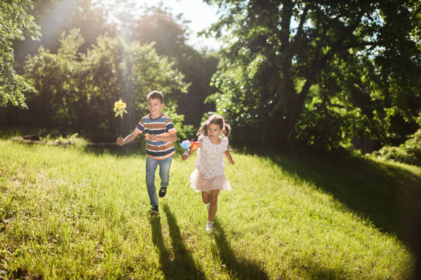 istock Beautiful children running in nature 1326923886