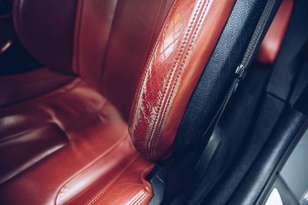 istock Damaged leather car seat. Car interior 1326924514