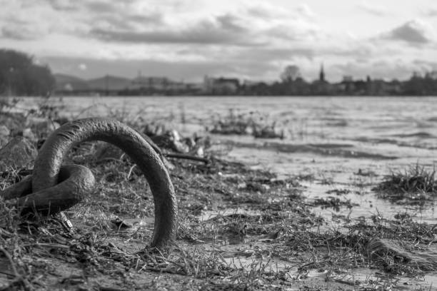 An anchor ring on the pier. black-and-white