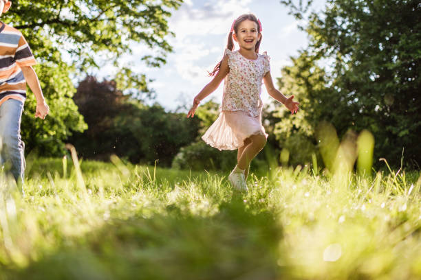 istock Beautiful children running in nature 1326925579