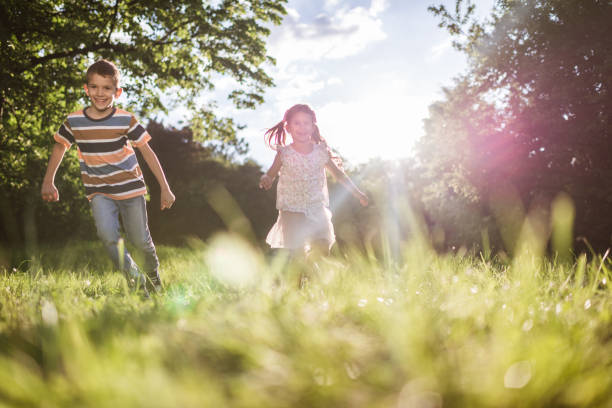 istock Beautiful children running in nature 1326925666