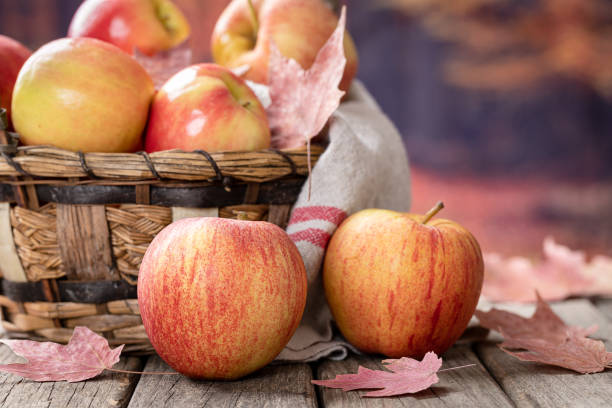 istock Fresh Red Apples on Wooden Table 1326927738