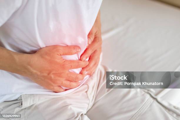 Stomachache Symptom Of Irritable Bowel Syndrome Chronic Diarrhea Colon Stomach Paincrohnâs Disease Gastroesophageal Reflux Disease Gallstonegastric Pain Stock Photo - Download Image Now
