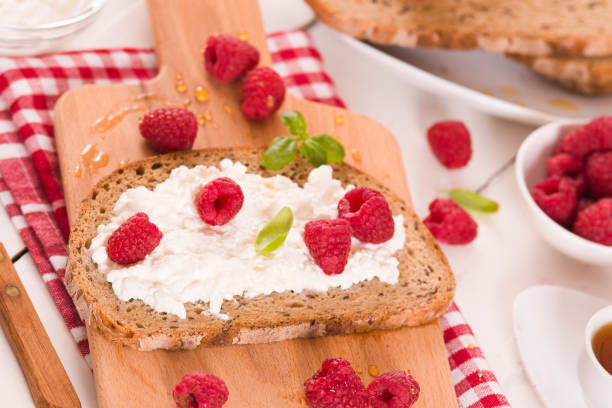 istock Rye bread with cottage cheese and raspberries. 1326931053