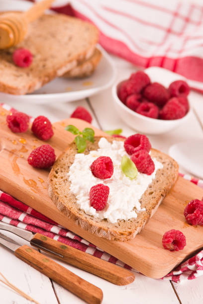 istock Rye bread with cottage cheese and raspberries. 1326931953