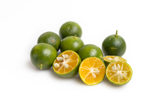 istock Green lime citrus fruits isolated on white background 1326933026