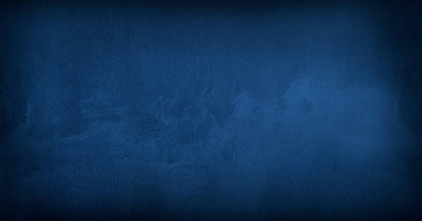 istock Black and blue abstract cement wall, interior texture for display products. wall background. 1326936953