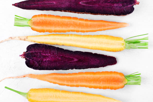 Purple carrots at the market. They are thought to have more vitamins and health benefits than their orange counterparts.