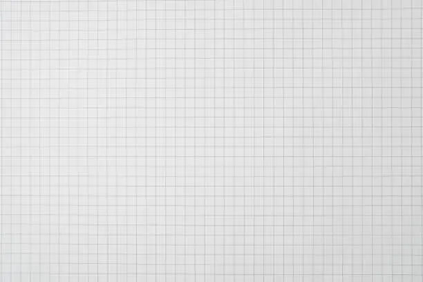 White blank sheet of checkered paper for background.