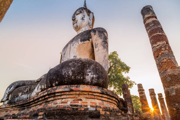 istock Pagoda Buddha statue at Sukhothai historical park 1326944155