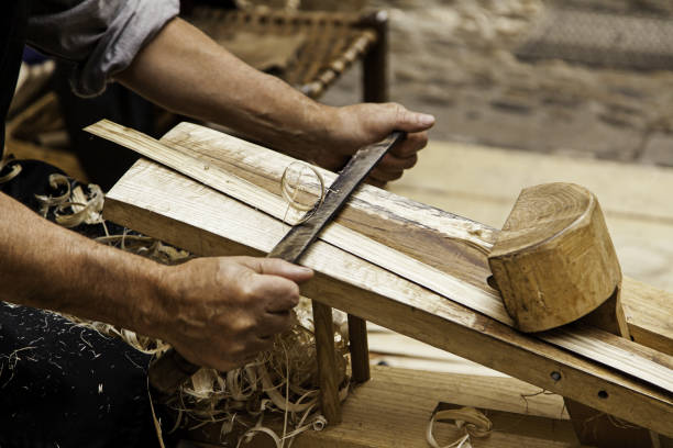 istock Removing wood chips in a traditional way 1326945482