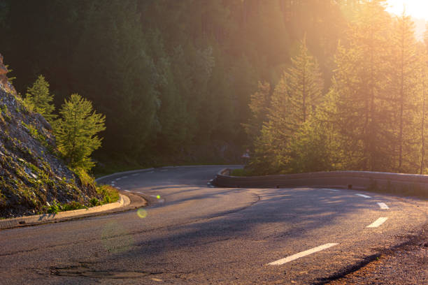 istock Mountain road in the evening in summer 1326947739