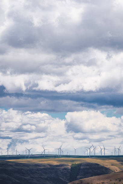 istock Wind Turbines In The Grassland Under Cloudy Sky 1326951483