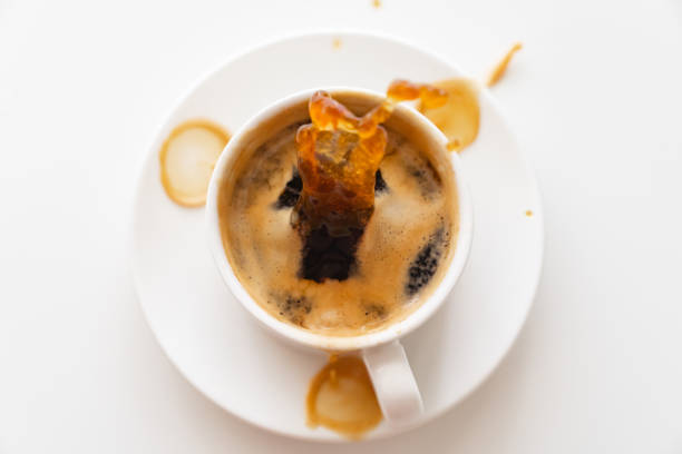 istock View top. from cup of coffee scatter splashes on the white table 1326953095