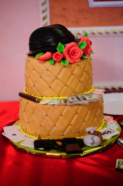 istock Golden cake with roses on candy bar 1326954008