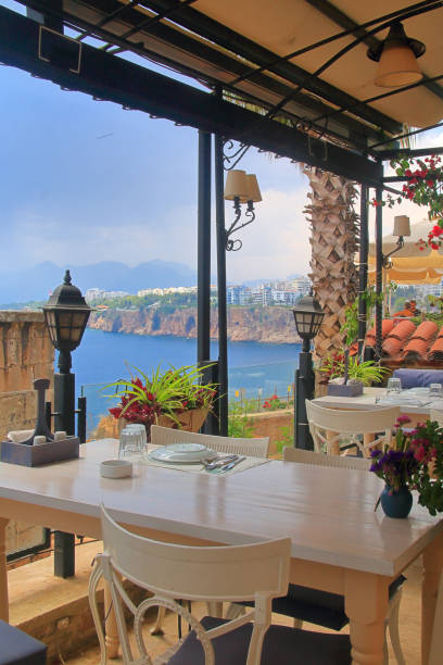 istock A table in a cozy cafe on the seashore. 1326955375