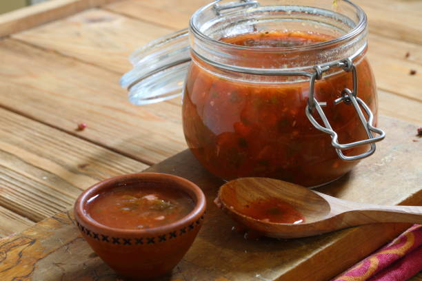 istock Georgian tkemali sauce on a wooden table 1326955593