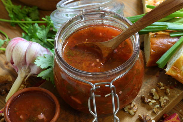 istock Georgian tkemali sauce on a wooden table 1326955607