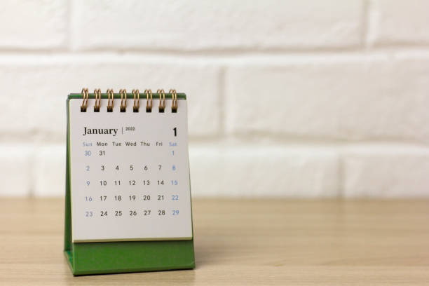 Calendar for January 2022 . Desktop calendar on a yellow background.Hello 2022. Calendar for January 2022 . Desktop calendar on a yellow background.Hello 2022 january stock pictures, royalty-free photos & images