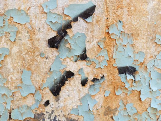 istock Peels of a paint on an old wall 1326957757