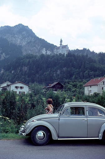 Hohenschwangau, Allgäu, Bavaria, Germany, 1964. Stopping the trip for a look up to Neuschwanstein Castle.