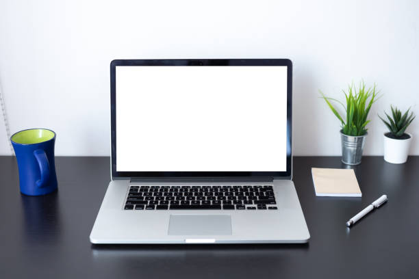 istock Front view. Laptop blank white screen on desk. Mockup. 1326961088