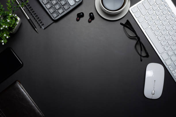 istock Top view of the keyboard, the mouse is placed on a black background. 1326961222