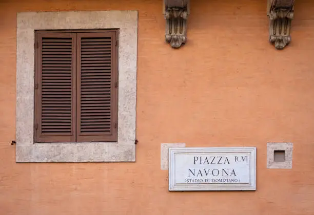 Street name sign of Piazza Navona (Navona's Square) in Rome, Italy.