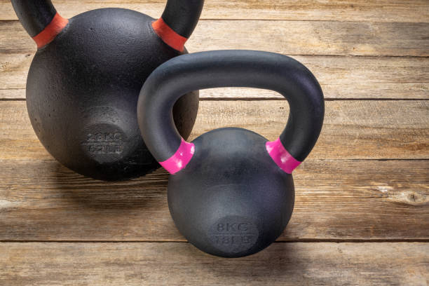 istock heavy iron kettlebells on a rustic wood 1326966045