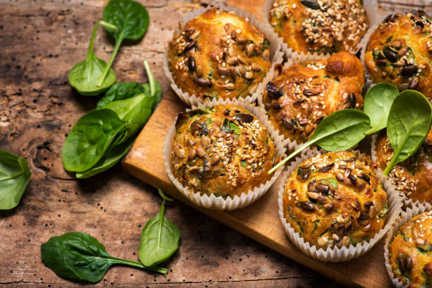 istock Muffins with eggs, spinach potatoes and cheese on a cutting board top view 1326966239