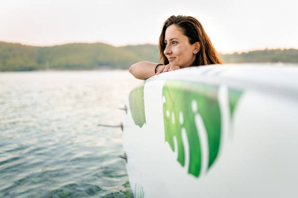 Young woman coming from SUP