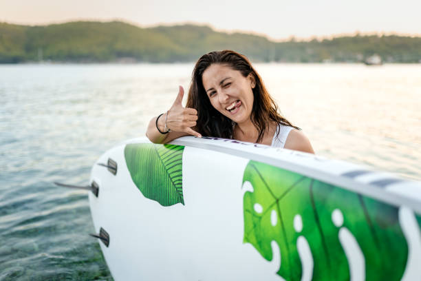 Young woman coming from SUP