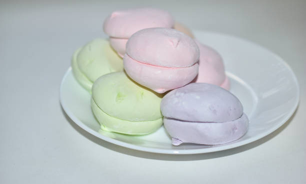 istock Colorful delicious marshmallows on a white plate 1326969713