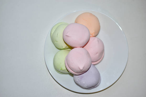 istock Colorful delicious marshmallows on a white plate 1326969721