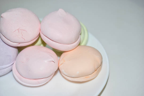 istock Colorful delicious marshmallows on a white plate 1326969808
