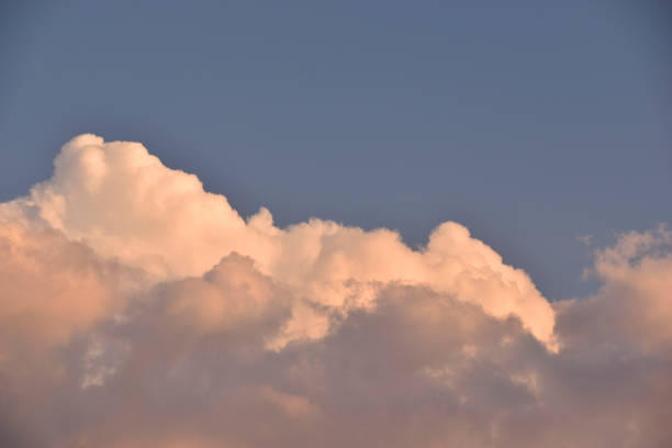 istock Evening cumulus red and blue clouds over the city 1326969935