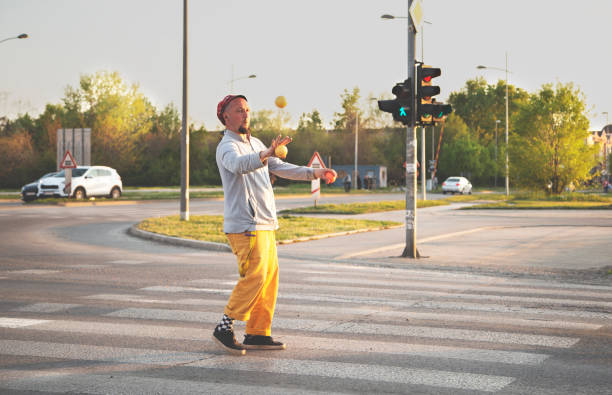 istock A juggler working in traffic. 1326970985